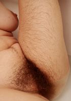 ATK Archives: Amber (Hirsute babe Amber takes a bath soaping up her hairy pussy)
