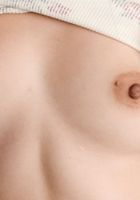 ATK Exotics: Asia Zo (Asia Zo straddles a chair!)