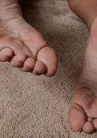 ATK Exotics: Cherry Hilson (Ebony Cherry shows off her feet)