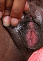 ATK Exotics: Coffee (Black model Coffee spreads her pussy)