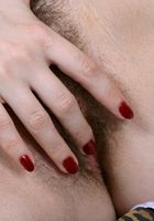 ATK Archives: Eclipse (Sexy voluptuous babe Eclipse fingers her hairy pussy)