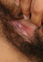 ATK Exotics: Grace (Grace is one hot and sexy black babe teasing with her hairy pussy)