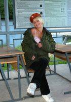 ATK Archives: Kate (Kate dons her beret and fatigues and poses her slim body.)