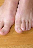 ATK Archives: Laura (Naughty blonde amateur Laura teases and spreads her toes)