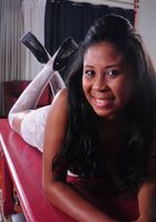 ATK Exotics: Layania (Layania is wearing a see-through negligee and stockings!)