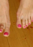 ATK Archives: Lola (Tall coed Lola loves to tease with her sexy little feet.)