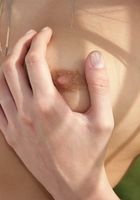 ATK Archives: Lola (Horny babe Lola gets naked and fingers her pussy outdoors.)