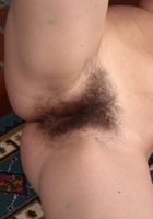 ATK Natural & Hairy: Olga Cabaeva (Olga kicking her stockings off of her sexy legs.)