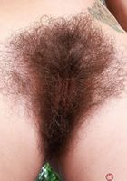 ATK Natural & Hairy: Pearl Sage (Pearl Sage in a dark red corset)