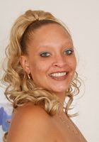 ATK Exotics: Roni (Roni poses in an elegant gown before exposing it all for you.)