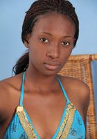 ATK Exotics: Tassara (Black model Tassara takes off her bikini)