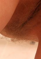 ATK Archives: Zinaida (Naughty babe Zinaida teases and fingers her hairy pussy)